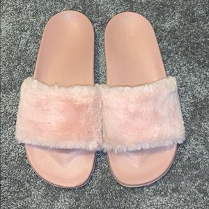 Pink fuzzy slippers